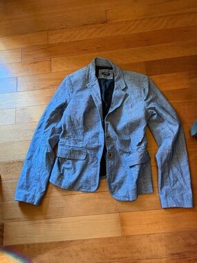 J. Crew women’s blue chambray Schoolboy blazer featuring a two-button closure